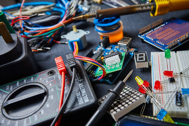 electronic board and tools repairs on black background - Photo, Image