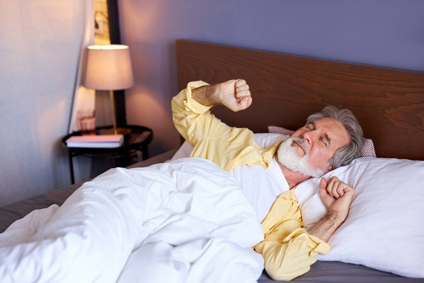 mature man waking up in the morning - Foto, Imagen