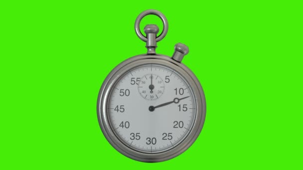 Realistic stopwatch with moving arms measures one minute on green screen - Footage, Video