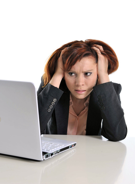 sad business red haired woman in stress at work with computer - Photo, Image