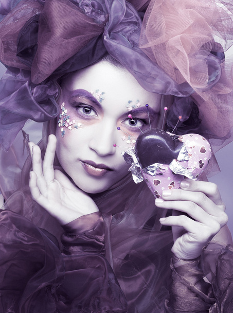 Young woman with chocolate - Valokuva, kuva