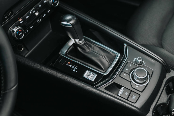 Novosibirsk, Russia  September 12, 2020  Mazda CX-5, Close-up view of the automatic gearbox lever. Interior car,  automatic transmission gearshift stick  - Fotografie, Obrázek