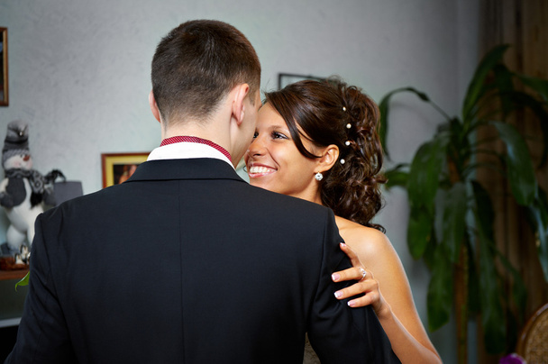 Embrace bride and groom - Foto, Imagen