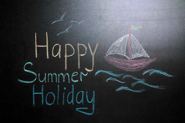 Inscription Happy Summer Holiday and drawing of boat on blackboard. School break - Foto, Bild