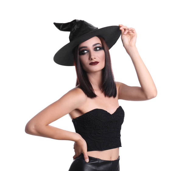 Mysterious witch wearing hat on white background - Foto, Imagem