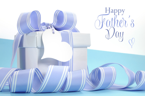Blue Fathers Day gift with beautiful stripe ribbon - Photo, Image