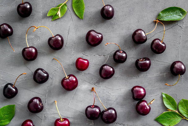 Fresh cherries pattern, top view. Food berries background - Foto, imagen