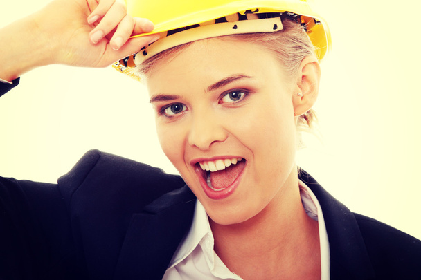 Confident female worker in helmet - Foto, immagini