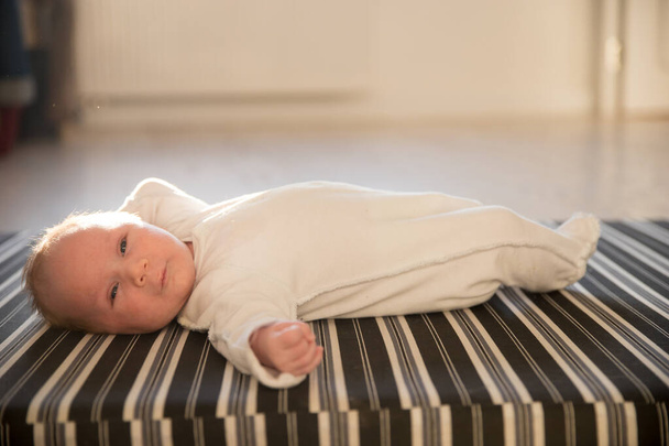 A newborn baby lying on his back - Photo, Image
