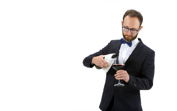 Portrait of male sommelier in suit isolated over white background - Fotografie, Obrázek