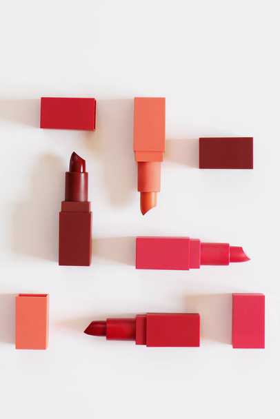 Set of open lipsticks on white background. - Photo, image