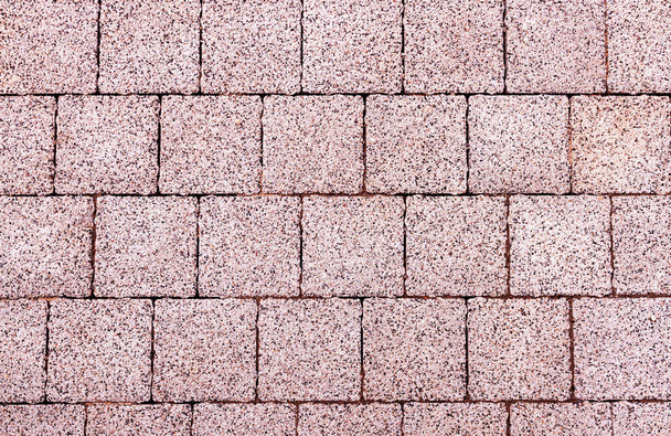 pink pavement background made of cement and small pebbles - Φωτογραφία, εικόνα