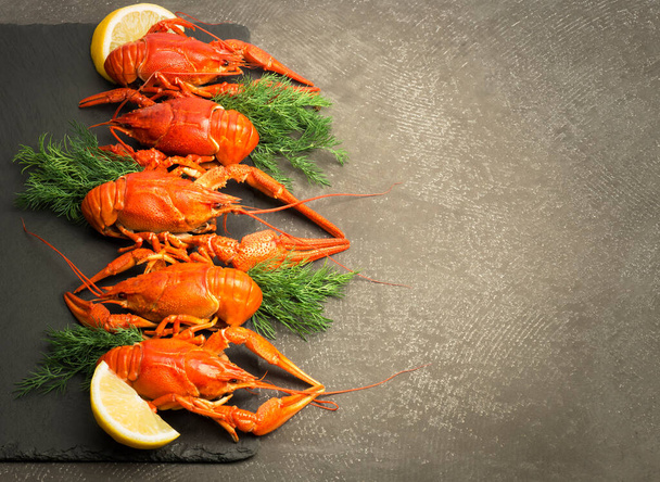 Red boiled crayfish on black background - Zdjęcie, obraz