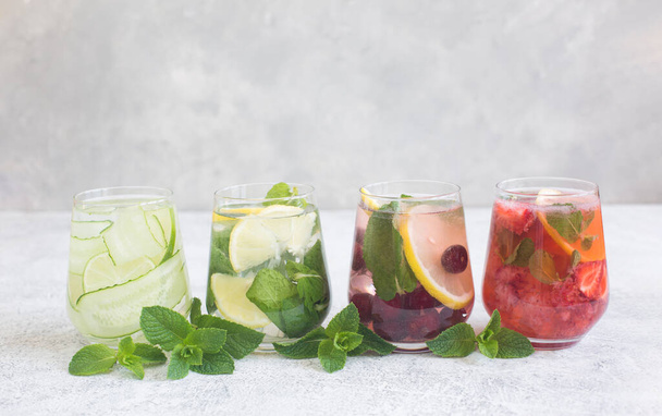 Assorted summer refreshments. Classic, strawberry and cucumber lemonade. - Photo, Image