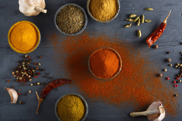 Various colorful spices on wooden table, top vie - Photo, Image
