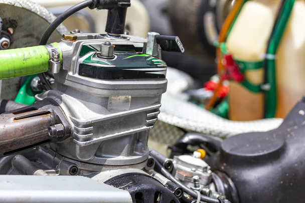 Close up aluminum cylinder head of 4 stroke engine of sport go kart racing (mini car) - Photo, Image