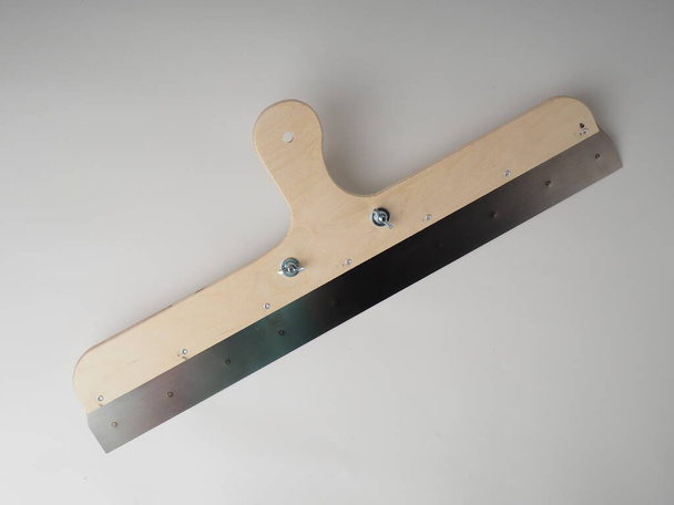 carpet installation tool. comb and trim carpet, tool isolated. - Photo, Image