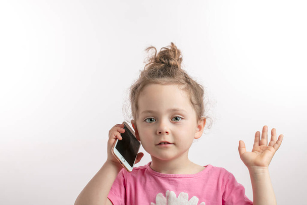 pleasant good looking girl is making a phone call to daddy - Photo, image