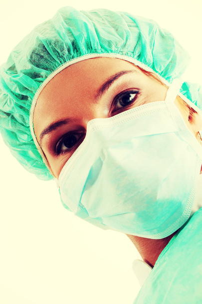 Doctor in surgical mask - Фото, изображение
