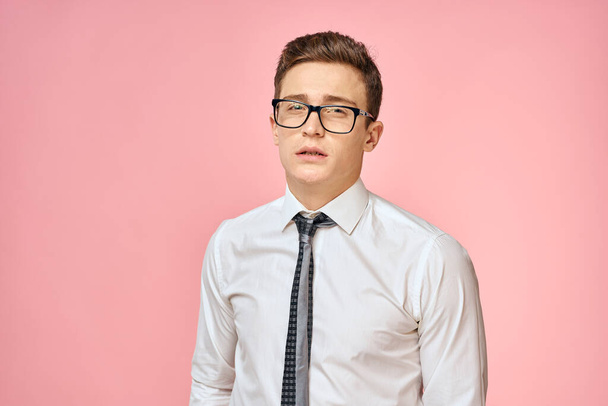 Business man in white shirt with tie wearing glasses self-confidence official pink background - Valokuva, kuva