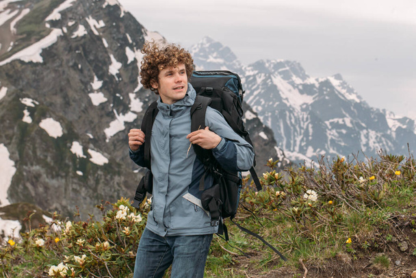 hiking tour concept. young active man is keen on hiking - Photo, Image
