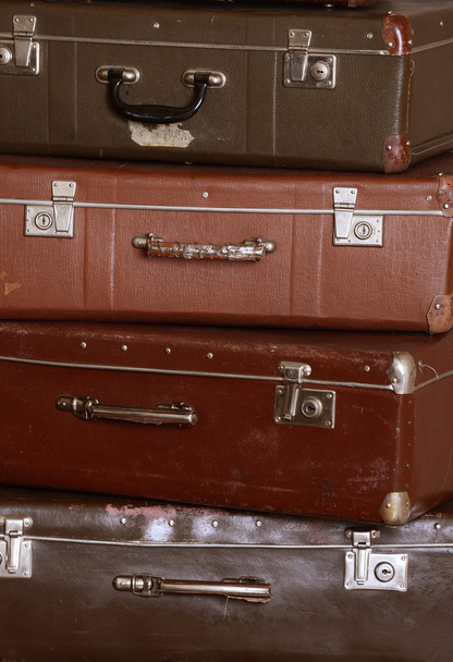 Old retro suitcases at a wall - Foto, afbeelding