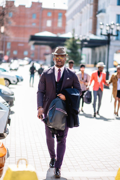confident successful businessman strolling on the street - Photo, Image
