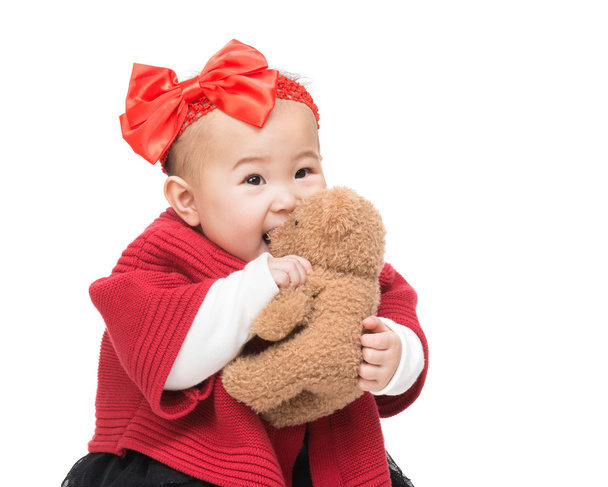 Aisa bebê jogar boneca
 - Foto, Imagem