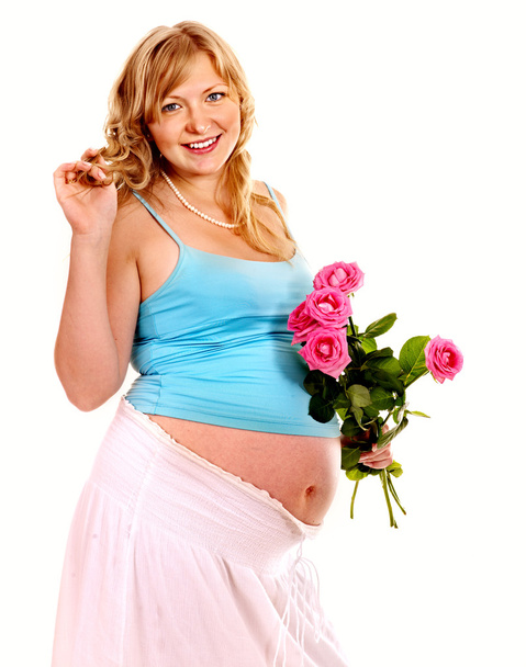έγκυος γυναίκα με λουλούδι. - Φωτογραφία, εικόνα