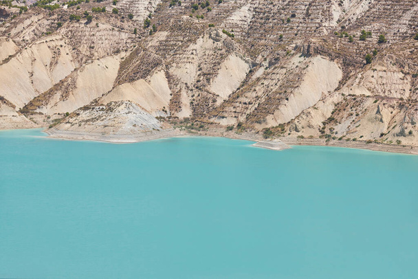 Badlands landscape and blue waters in Algeciras reservoir. Murcia, Spain - Photo, Image