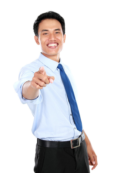 Young businessman pointing his finger at you - Foto, afbeelding