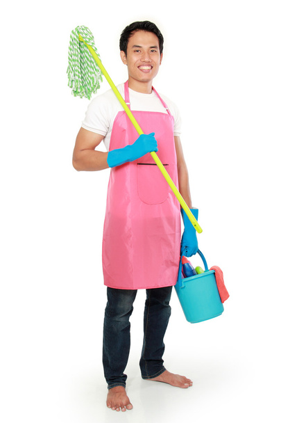 Portrait of young man with cleaning equipment - Фото, изображение