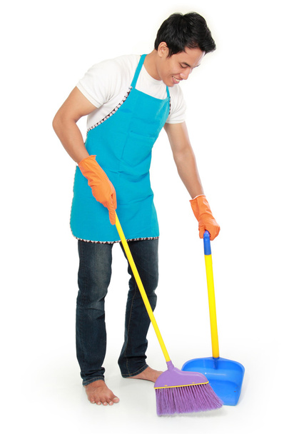 man sweep floor - Foto, imagen