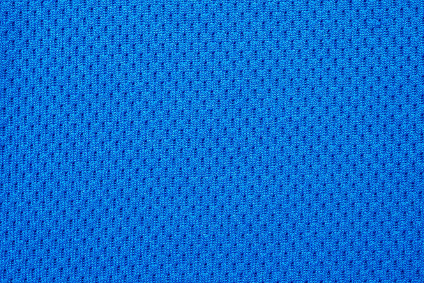 Μπλε αθλητικά ρούχα ύφασμα ποδόσφαιρο πουκάμισο φανέλα υφή close up - Φωτογραφία, εικόνα