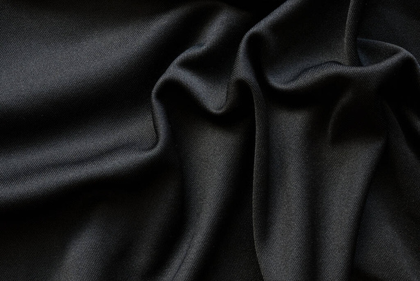Black fabric luxury cloth texture pattern background - Photo, Image