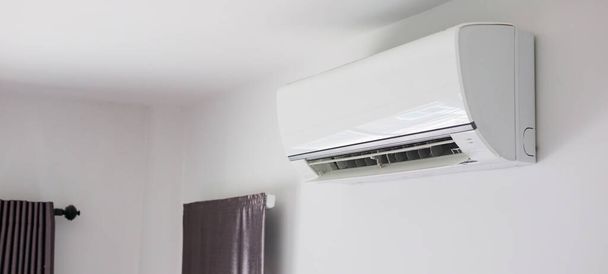 Air conditioner on white wall room interior background - Photo, Image