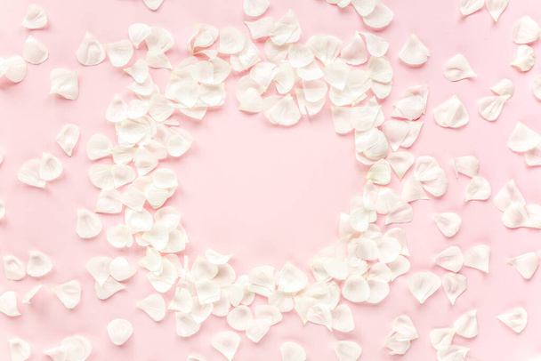 beige petals roses on pink background. Flat lay, top view. Valentines background. Valentines Day concept. - Zdjęcie, obraz