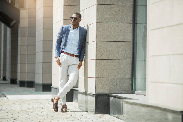handsome adult african man in suit and sunglasses - Valokuva, kuva