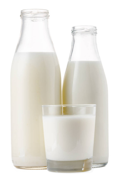 Glass cup and bottle of fresh milk isolated - Fotoğraf, Görsel