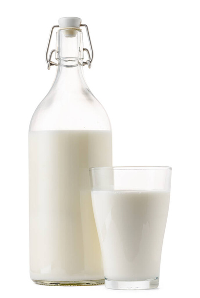 Closed glass milk bottle isolated on white background - 写真・画像