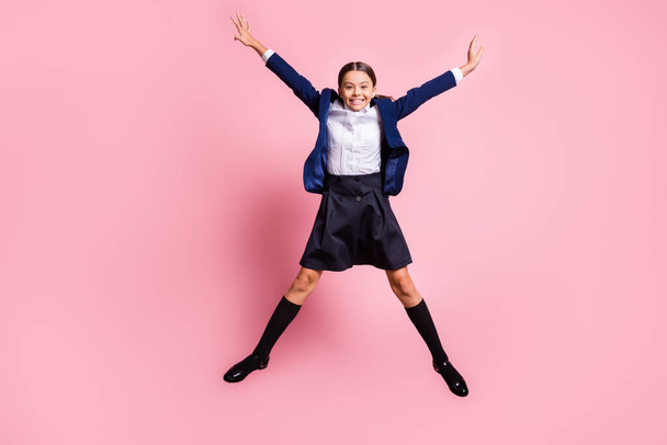Full length body size view of her she nice attractive pretty glad cheerful cheery small little girl jumping having fun good mood rest isolated over pink pastel color background - Fotoğraf, Görsel