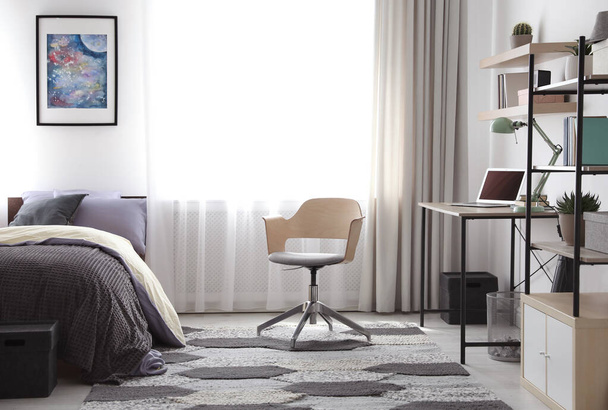 Modern teenager's room interior with workplace and bed - Foto, Imagem