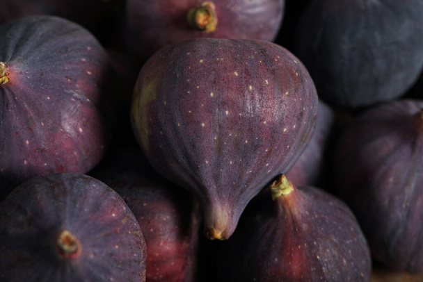 Tasty fresh figs as background, closeup view - Photo, image