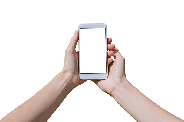 Isolate Smartphone-Attrappe, Nahaufnahme in weiblichen Händen. Weißer Hintergrund - Foto, Bild