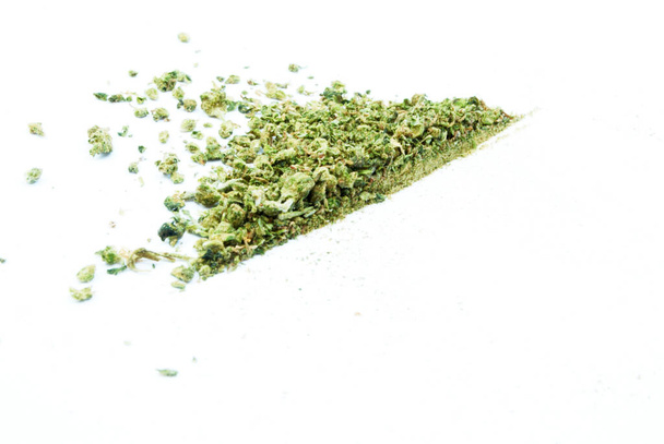 dried marijuana and cannabis shake on white background - Photo, Image