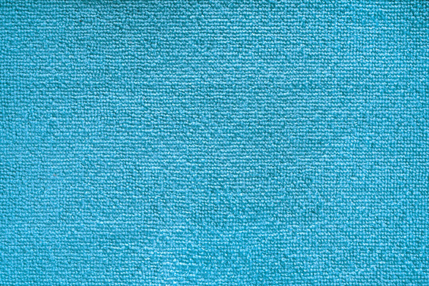 Microvezelpatroon schoonmaken. Blauwe polyester microvezeltextuur. Synthetisch vezelmateriaal Reinigingsdoek voor stof of keukenaanzicht - Foto, afbeelding