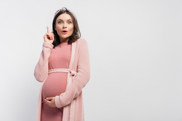 pregnant woman in headband having idea isolated on white - Zdjęcie, obraz