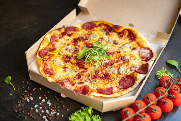 Pizza, salam, sosis, peynir. Fast food, üst görünüm. Metin yiyecek arka planı için fotokopi alanı. - Fotoğraf, Görsel