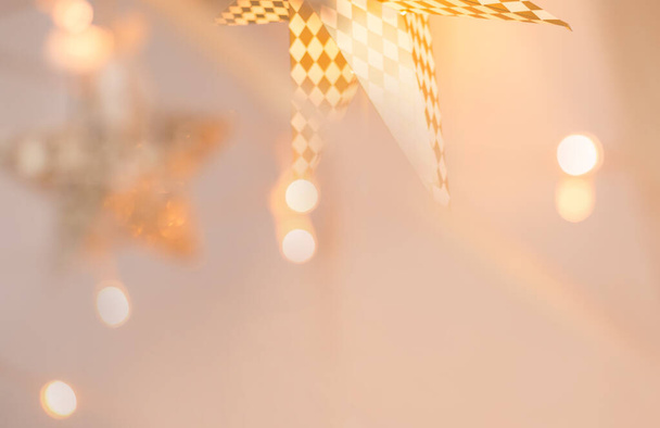 delicate Golden color against the background of blurred Christmas lights - Foto, immagini