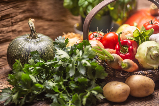 Selection of autumn fresh harvest of vegetables on a vintage wooden surface. - Foto, afbeelding